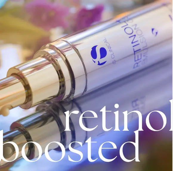 Close-up of iS Clinical Retinol Replenish serum bottle with gold pump on reflective surface
