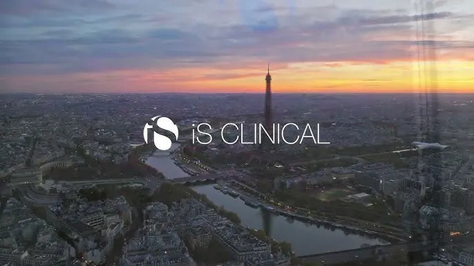 Aerial view of Paris at sunset with the Eiffel Tower and the iS Clinical logo overlay