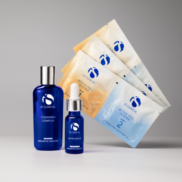 iS Clinical Limited-Edition Active Collection with blue Cleansing Complex bottle, Active Serum dropper bottle, and four Active Peel System sachets