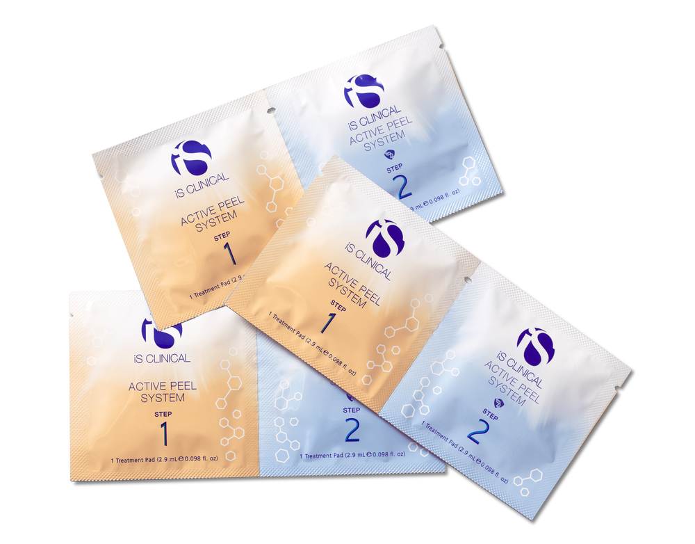 iS Clinical Active Peel System treatment pads in single-use packets, steps 1 and 2, beige and light blue packaging