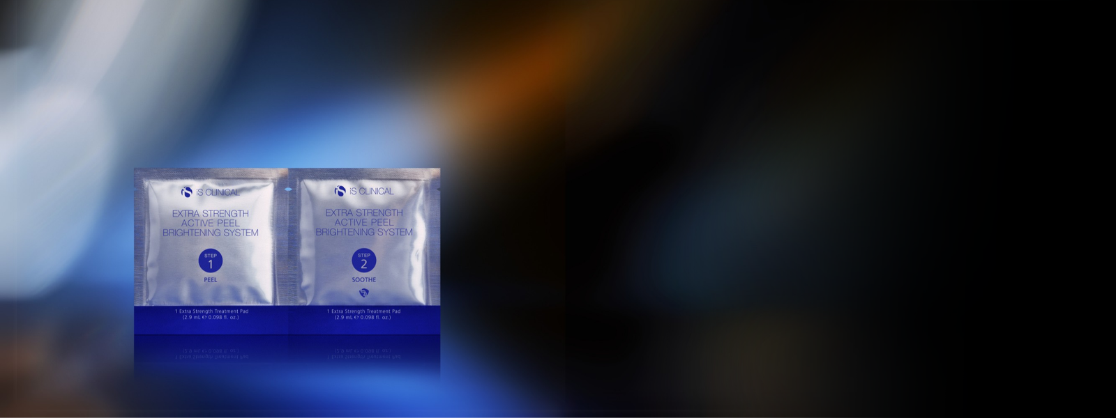 Two silver sachets of iS Clinical Extra Strength Active Peel Brightening System labelled Step 1 Peel and Step 2 Soothe