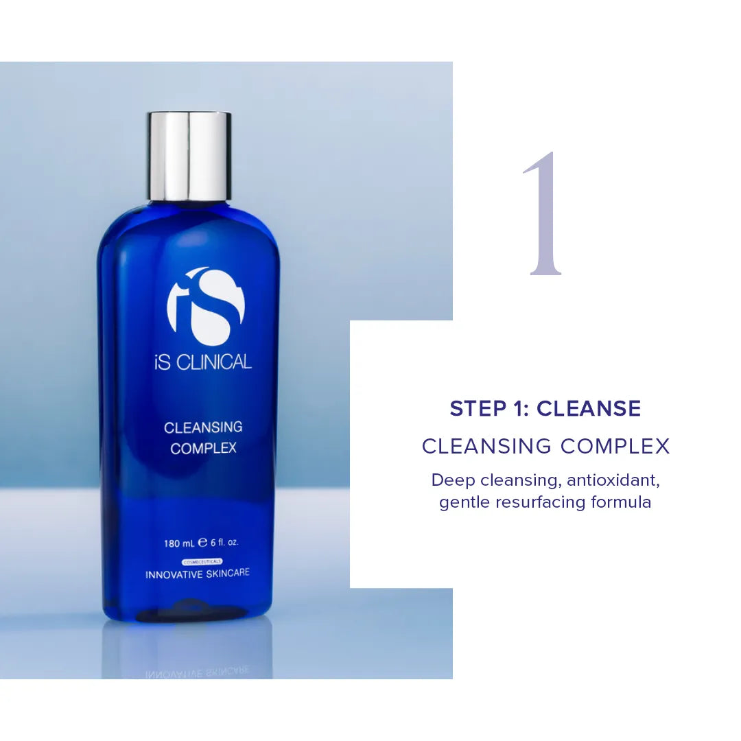 Blue bottle of iS Clinical Cleansing Complex with silver cap on pale blue background