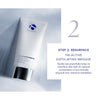 White tube of iS Clinical Tri-Active Exfoliating Masque with silver cap on white background