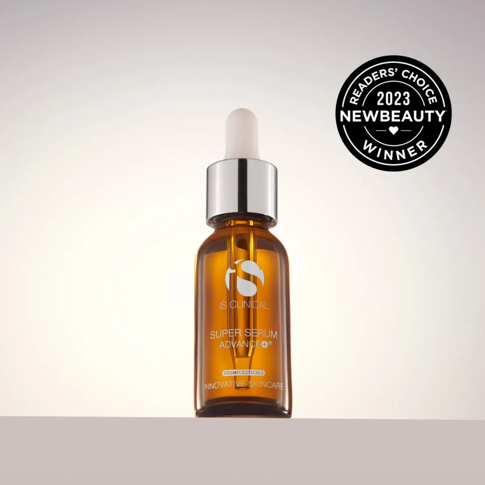 Amber glass dropper bottle of iS Clinical Super Serum Advance+ with silver cap on white background