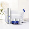 iS Clinical Youth Eye Complex pump bottle and Youth Intensive Crème jar with white cosmetic bag